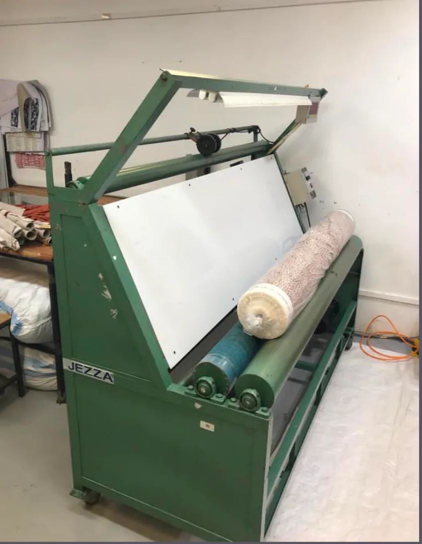 Fabric inspection or handling machine in the fabric store