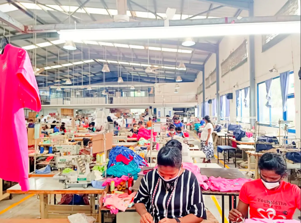 Sewing floor team working across production tables